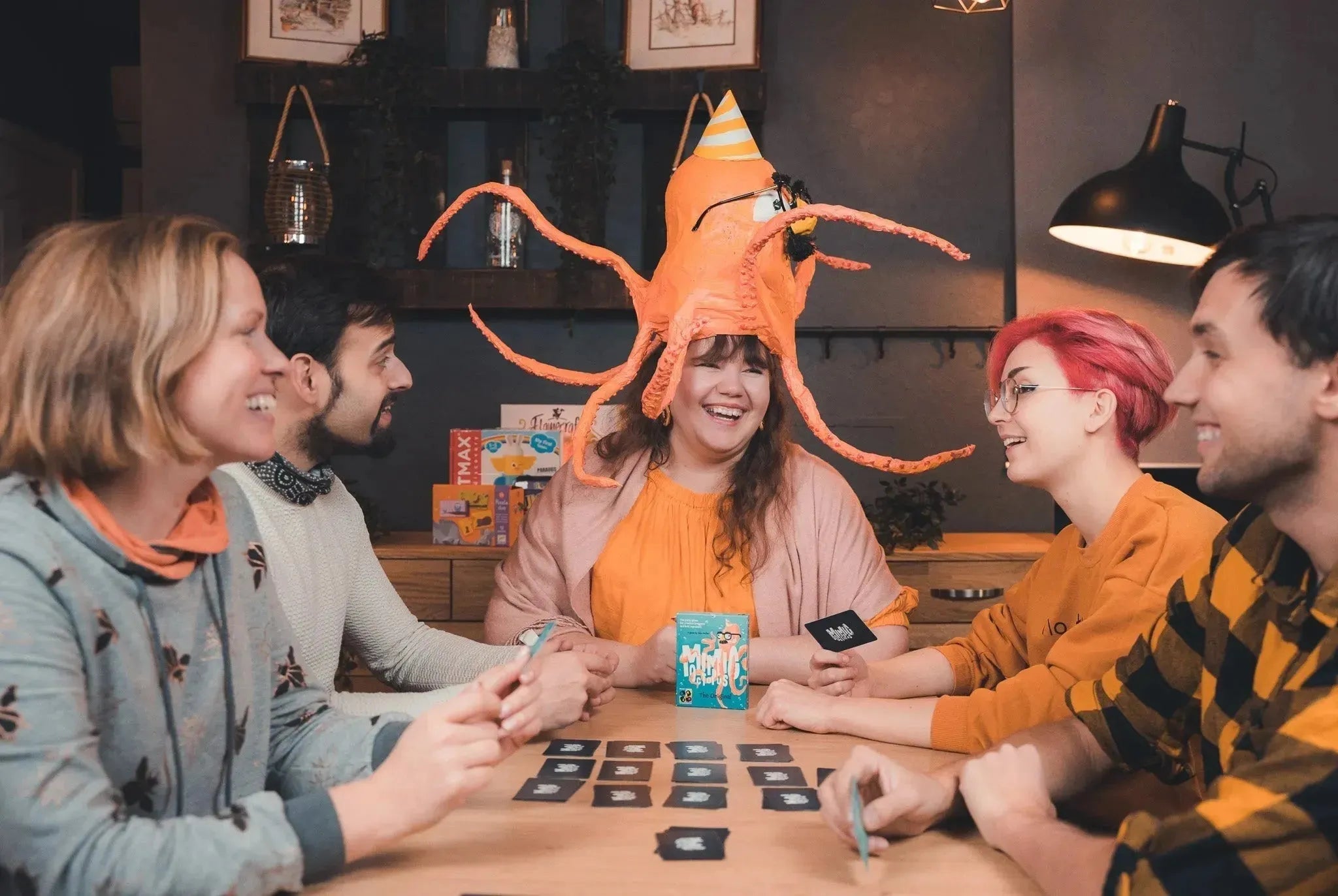 Vakarėlių stalo žaidimai: kaip vienas geras žaidimas gali pakeisti visą atmosferą-Brain Games LT